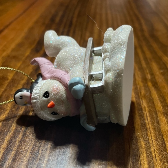 Vintage child snowman sledding snowman with baby penguin ornament. - Picture 4 of 4